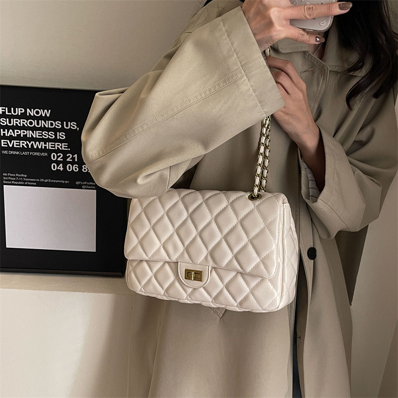 Sentido avanzado xiaoxiangfeng lingge Chain 2024 nuevos bolsos de color sólido mujeres soft Fashion 100 bolsos de hombro y axila