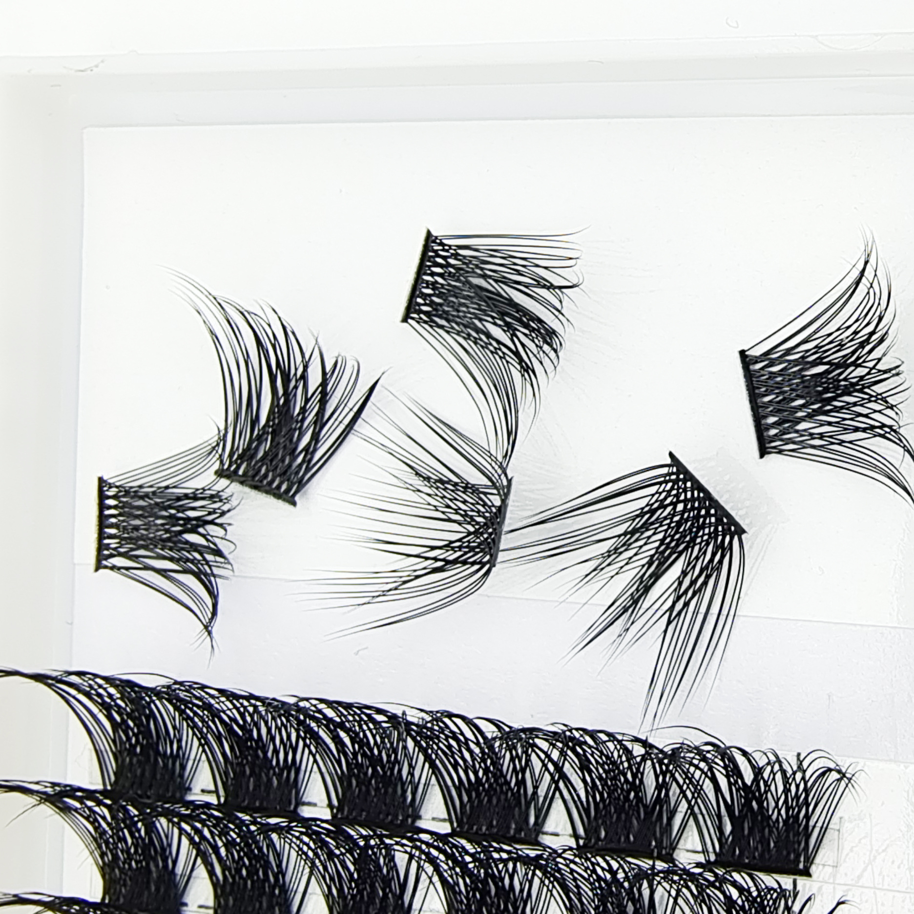 Europeo y americano segmentado grueso largo solo racimo pestañas postizas auto-injerto natural Cruz pestañas hechas a mano transfronterizas