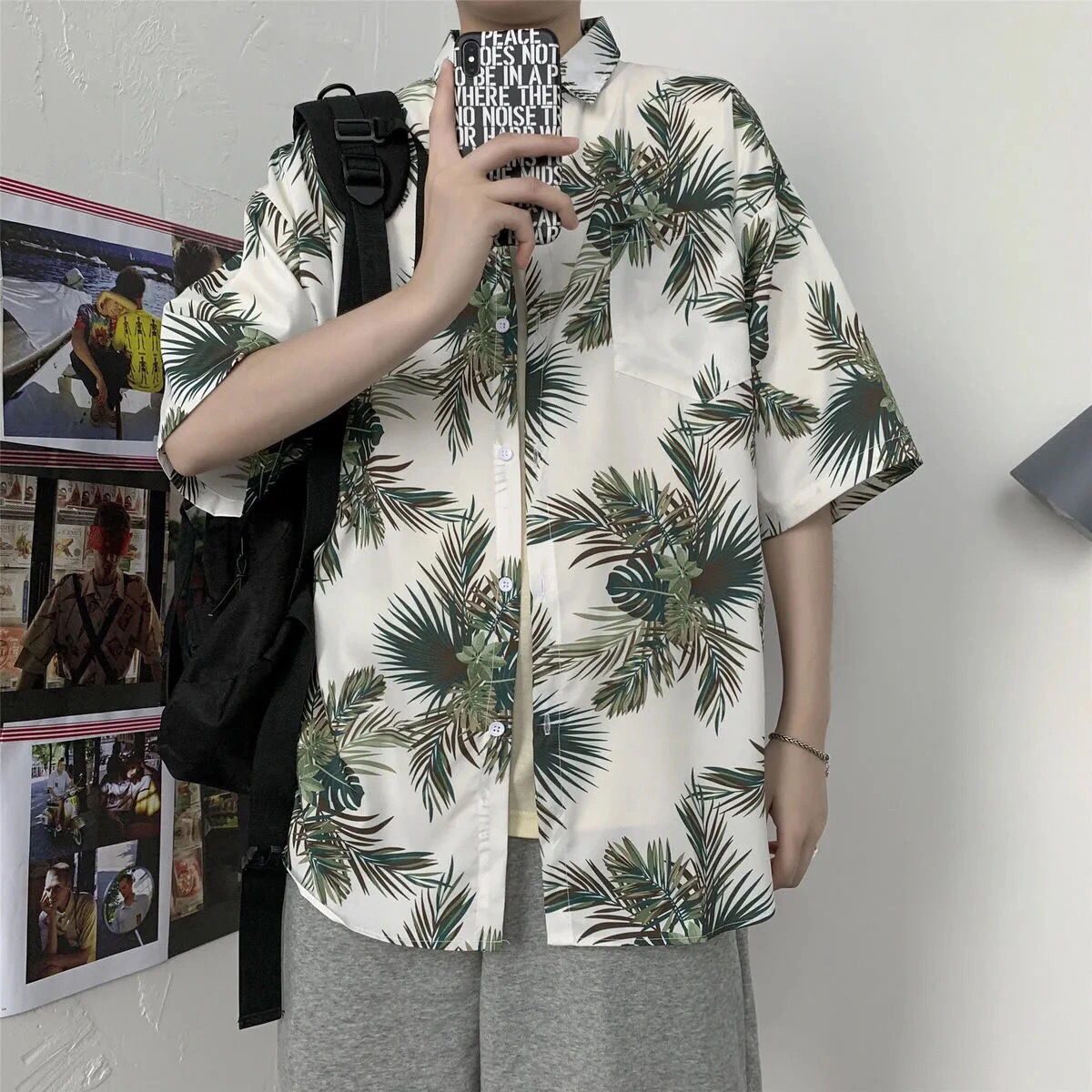 Camisa de moda de verano popular de moda juvenil de media manga elegante de Harajuku nuevo flojo artístico a juego para hombres