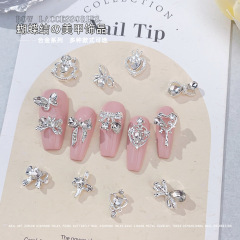 新しい合金の蝶結びのネイルアクセサリーの超閃水ドリルの蝶の小さい愛の爪のドリルのネイルアクセサリーの卸売り