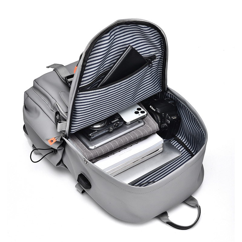 Mochila de nuevo estilo 2025 para hombres y mujeres, mochila escolar deportiva de ocio al aire libre, mochila de viaje de gran capacidad con película de cuero, mochila ligera