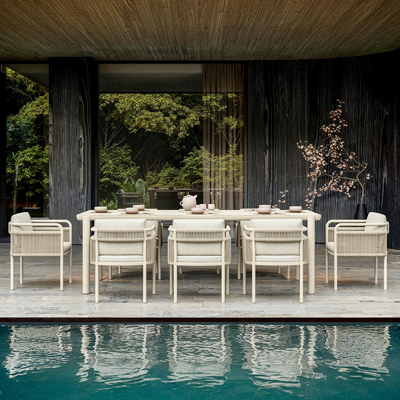 Mesa y silla de ocio al aire libre patio jardín al aire libre muebles impermeables y protectores solares alojamiento residencial hotel chalet percha combinación de silla de caña