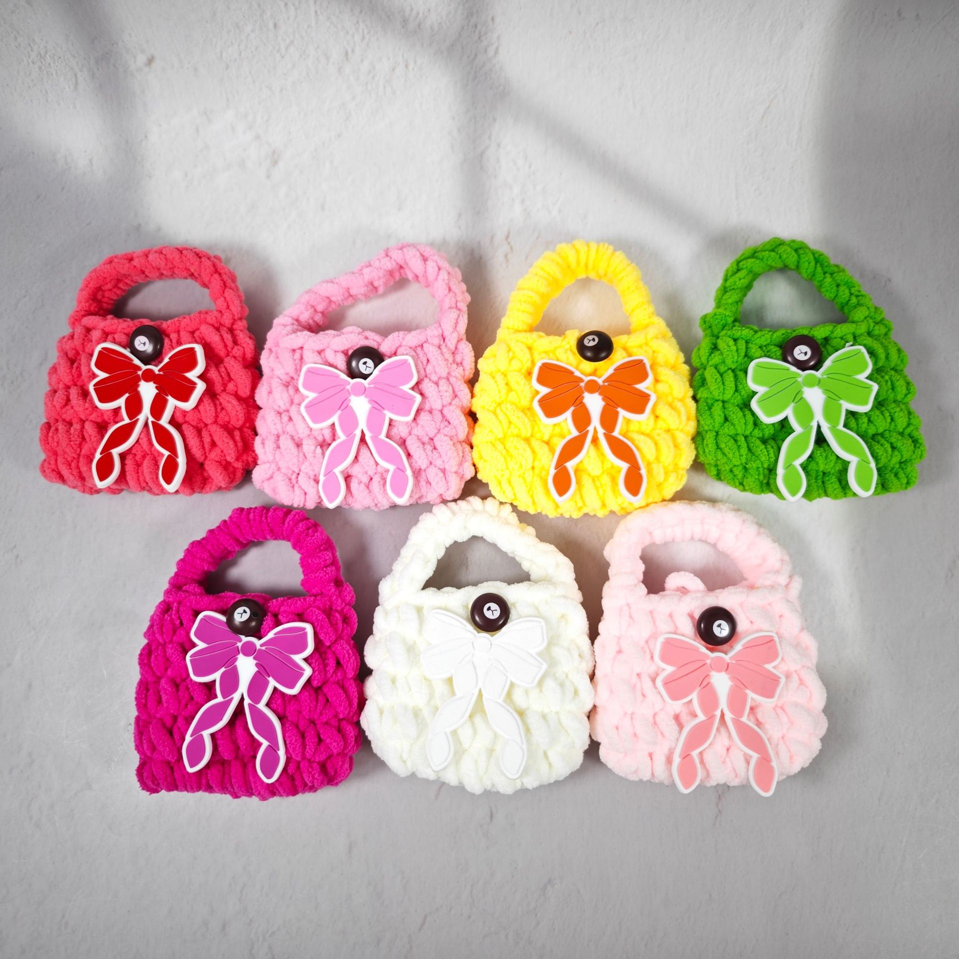 Nuevo lindo oso regalo tipo arco bolsas de auriculares de punto bolsas de cambio de color sólido bolsas de cambio de peluche