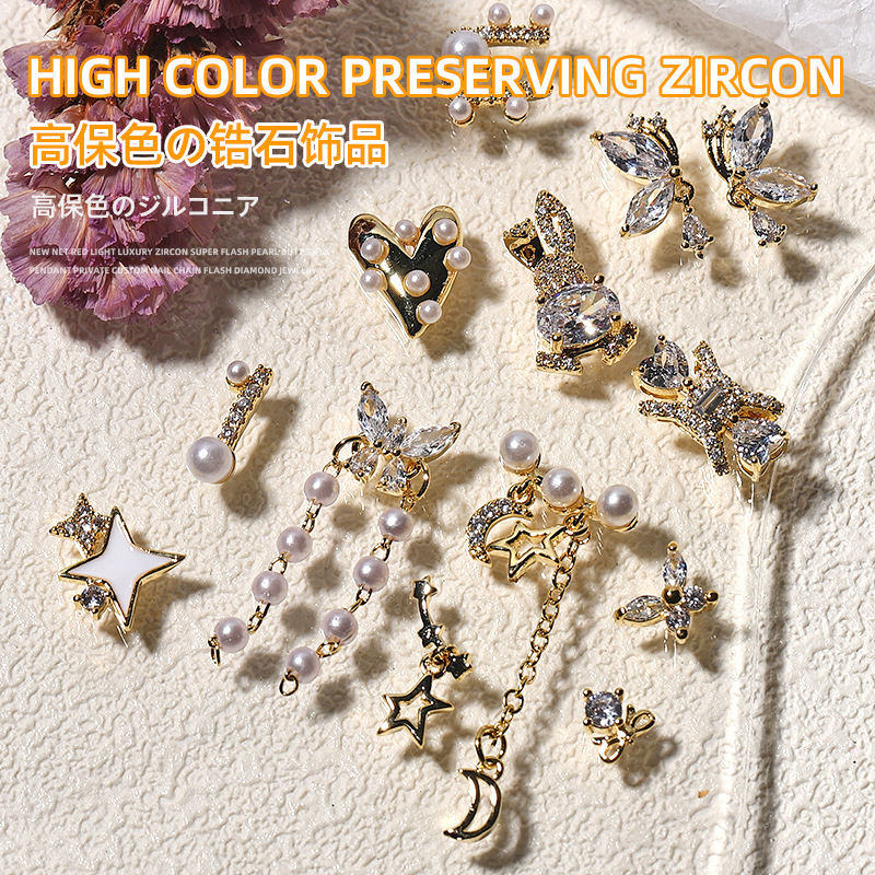 Nueva luz de la celebridad Internet lujo circón Super Flash Perla Cadena amor mariposa colgante uñas Oro Cielo Estrellado Estrella Diamantes