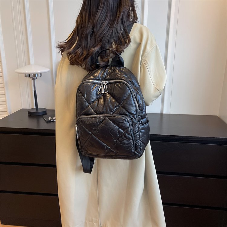 Mochila de algodón acolchada transfronteriza mochila de rombo para mujer 2023 nueva gran capacidad estilo coreano casual viajero estilo coreano viaje de regreso
