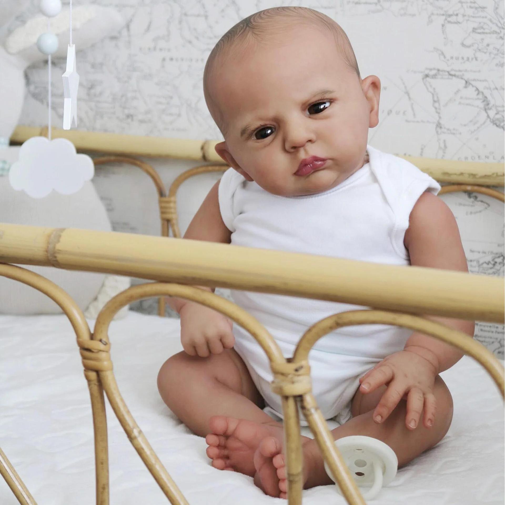 60cm de simulación de cuerpo de tela renacer muñeca Cameron transfronteriza suministro de la venta caliente entrega de una sola pieza