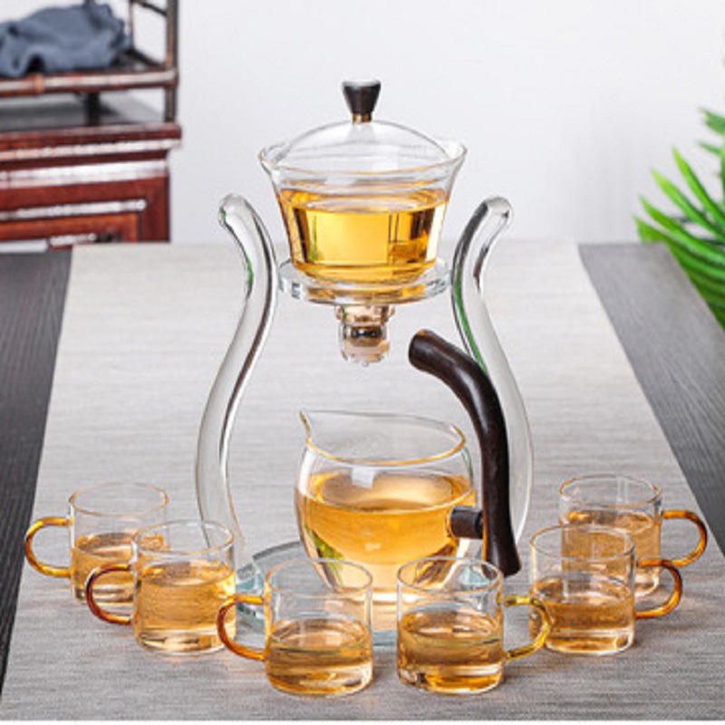 Fábrica al por mayor de vidrio transparente fabricante de té traje de succión magnética juego de té perezoso fabricante de té con soporte Palacio Lámpara juego de té traje