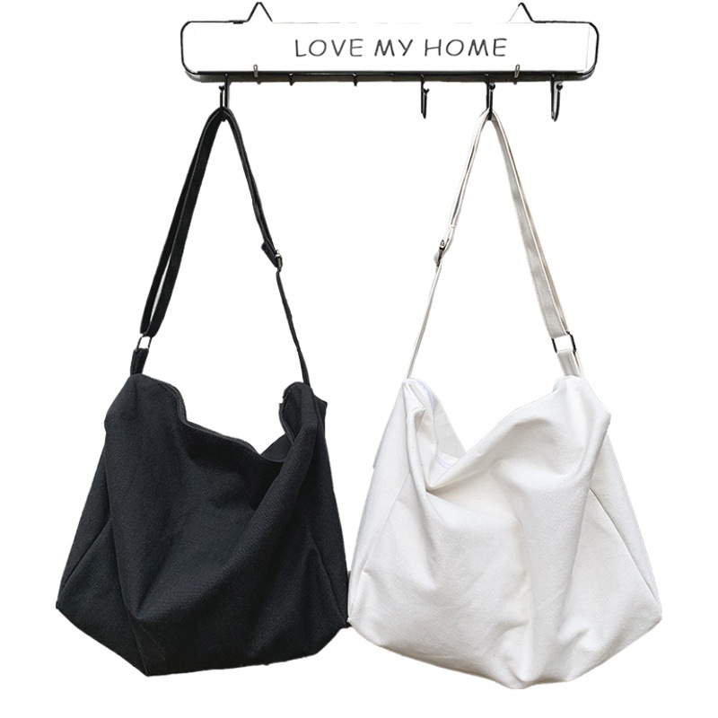 Nuevo negro perezoso bolsa de lona crossbody gran capacidad libro simple todo-fósforo bolsa de lona para hombres y mujeres estudiantes