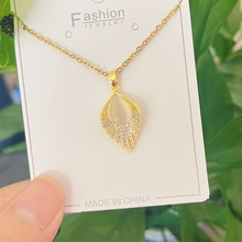 金色微镶锆石叶子项链2024年新款铜微镶水滴猫眼石网红钛钢o字链