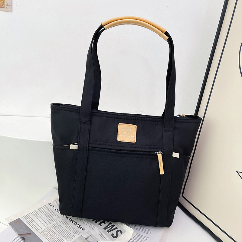 Bolso de mano simple de un solo hombro de gran capacidad en vivo Bolso diagonal de moda casual para mujer 2024