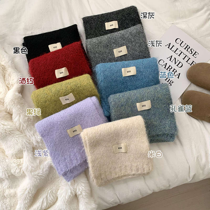 Bufandas de invierno femeninas de alta calidad 2025 nuevo color sólido calentamiento imitación de cachemira collar bufandas de punto al por mayor