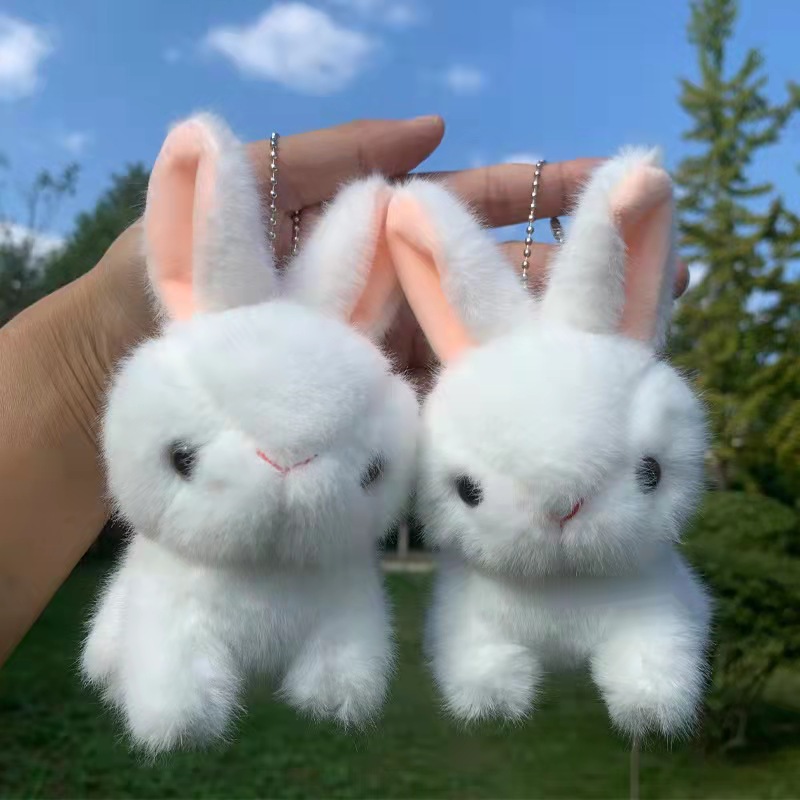Lindo pequeño conejo blanco colgante de peluche de juguete muñeca de dibujos animados pequeño conejo muñeca de trapo máquina de agarre pequeña bolsa de muñeca adornos