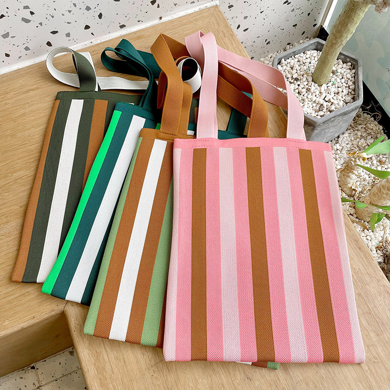 Estilo coreano nicho de diseño de color de contraste de rayas de punto bolso de hombro simple todo partido de gran capacidad bolsa de compras bolso de las mujeres