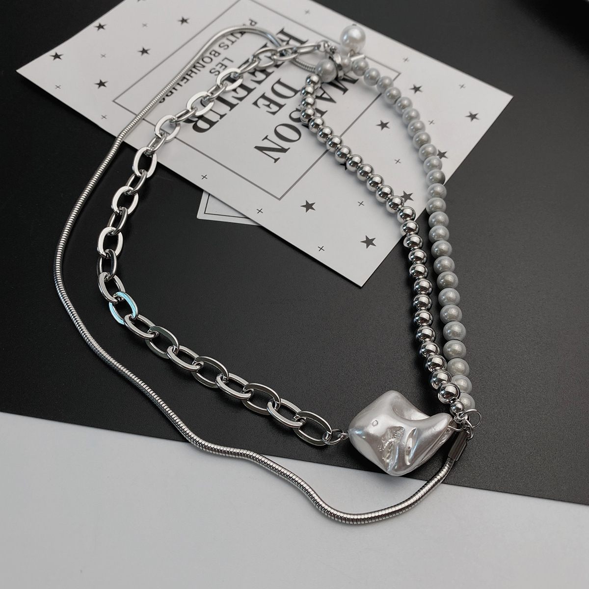 Retro Inlaid Pearl Chain Irregular Simple Titanium Steel Collarbone Chain display picture 3