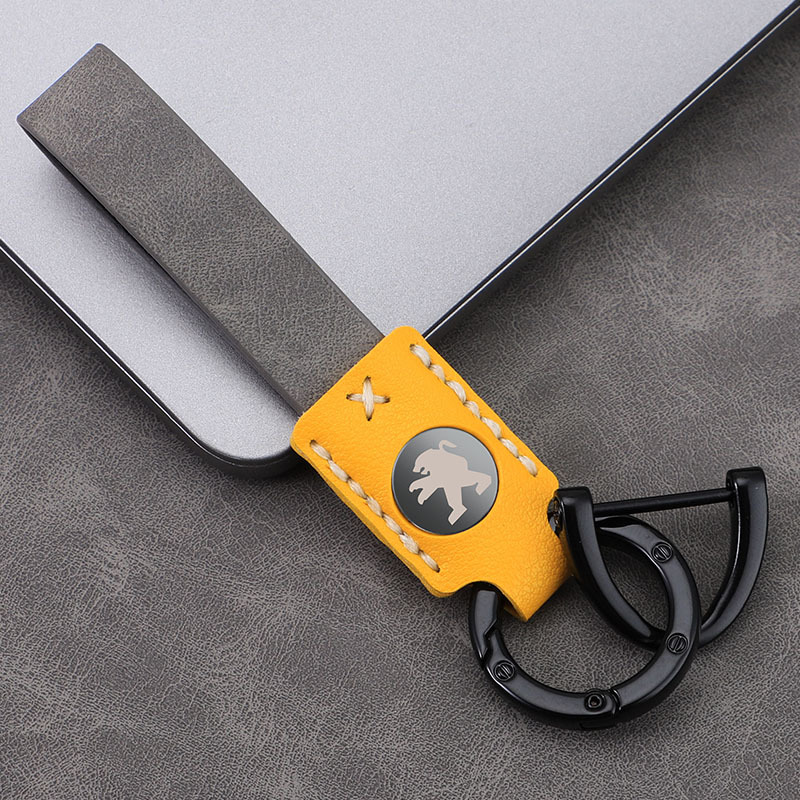 Llavero de coche láser láser cerradura de cuero de alta gama hebilla colgante de llave cuero duradero colgante de llavero de alta temperatura