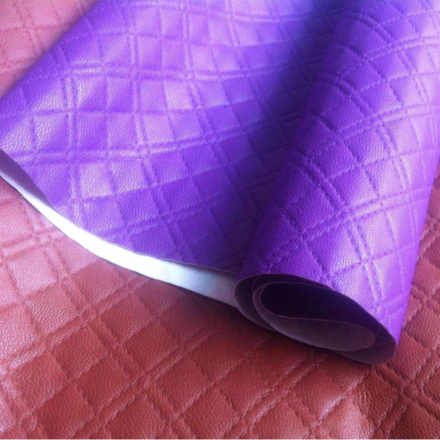 乱纹提花皮革 人造革库存面料箱包革文具包装发泡革厂家