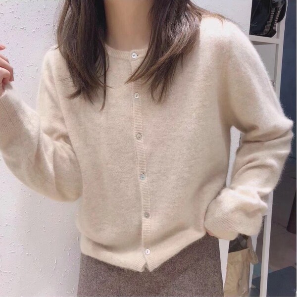 Autumn purple knitted cardigan with a round collar
