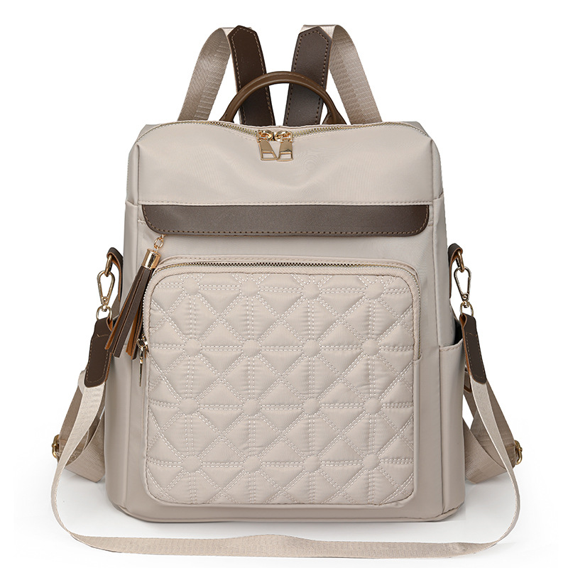 Mochila de nailon multifuncional para mujer 2024 nuevo estilo casual mochila de viaje de viaje línea de bordado de moda mochila escolar de gran capacidad