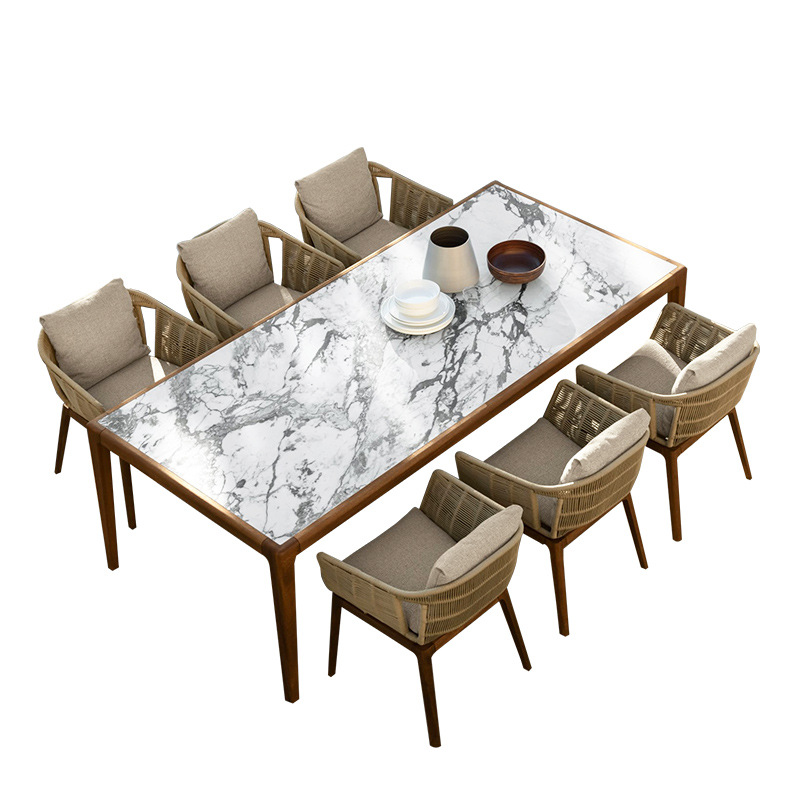 Mesas y sillas de comedor de madera maciza de teca al aire libre Combinación de muebles de jardín de villa Casa de familia Silla de ratán de estilo de ocio nórdico al aire libre