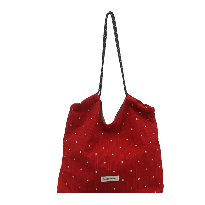 Bolsos de mujer 2025 nuevo estilo verano simple estilo casual bolso Tote bolso de lona clásico lunares bolso de moda de mensajero de un solo hombro