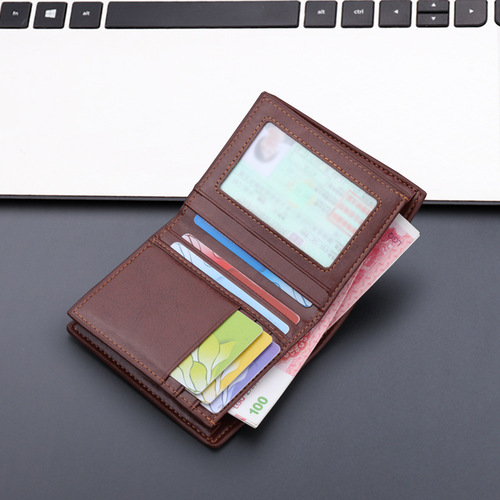 Men's short, vertical-style leather wallet with zipper and reinforced design—anti-scan feature—leather texture in lychee pattern