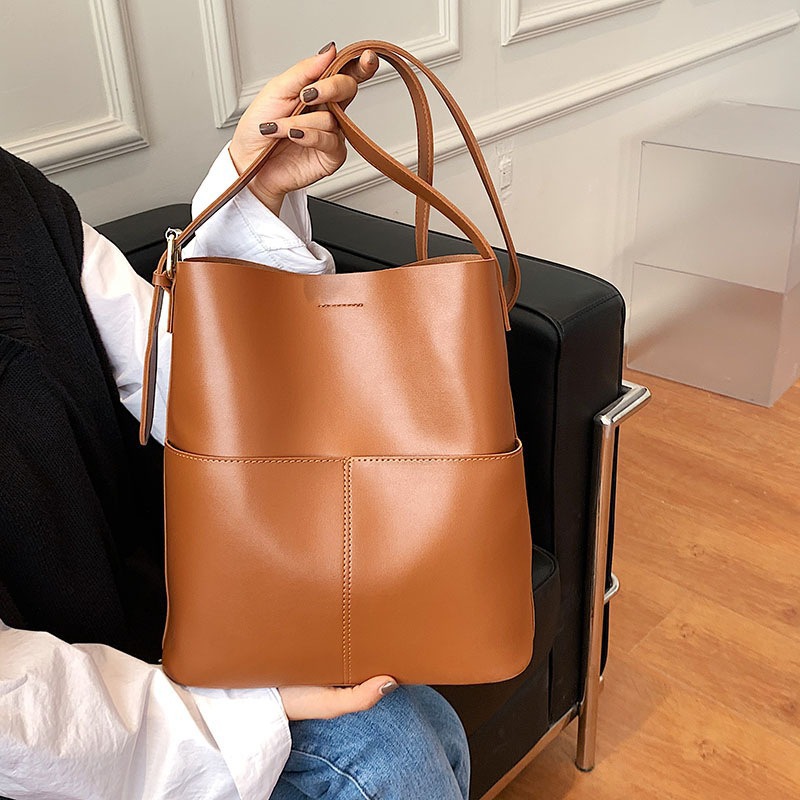 Lady New Women's Simple Versatile High-Quality Large Capacity Design Sense Shoulder Bag Crossbody Bucket_voghion.com