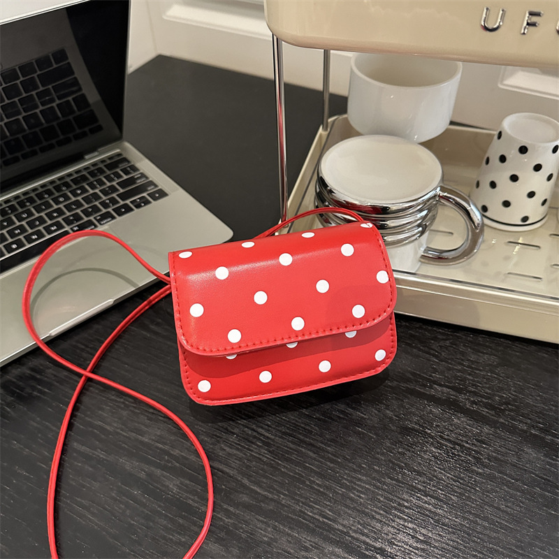 2025 primavera nuevo estilo estilo estilo extranjero simple mochila puede amar la bolsa de princesa de color ondulado punto de cambio bolsa pequeña