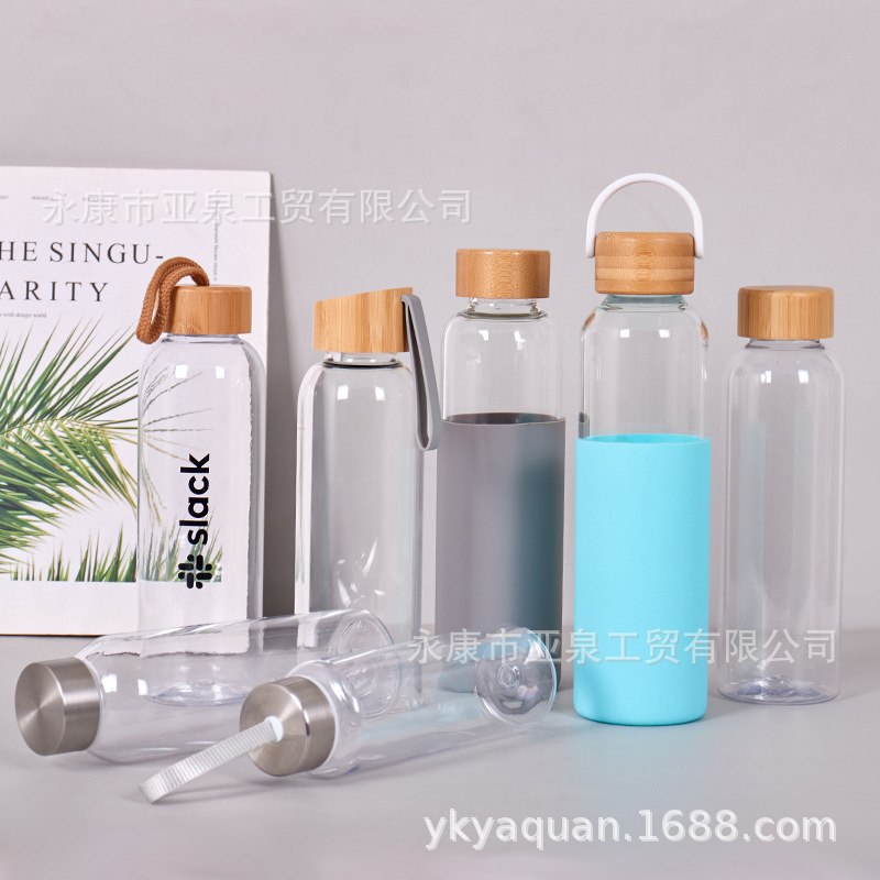 Suministro directo de fábrica Taza de vidrio con tapa de bambú transparente Taza de agua de vidrio de té de oficina de gran capacidad Taza de plástico transparente al por mayor