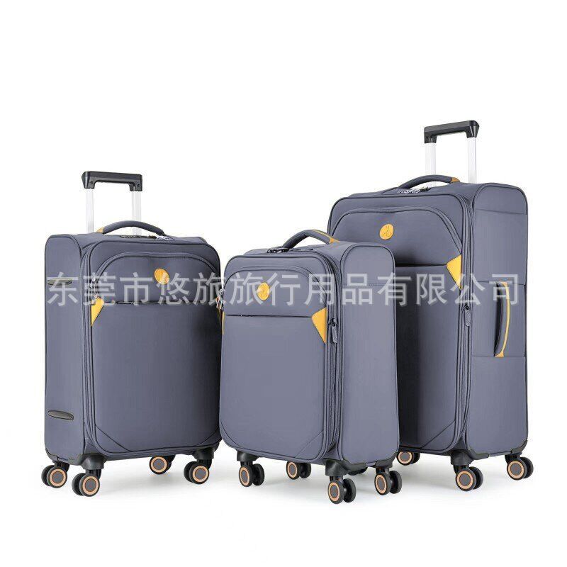 牛油果牛角撞色彩色布箱现货耐摔可站成人手把万向静音轮铝拉杆箱