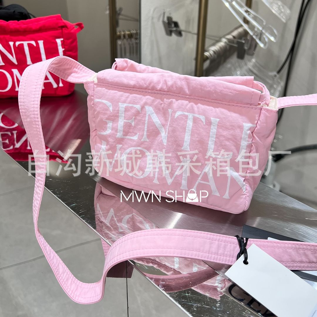 Diseño de nicho de mini albóndigas de la marca tailandesa de moda Gentle Woman 2024 nuevo bolso de hombro con cuerda de extracción