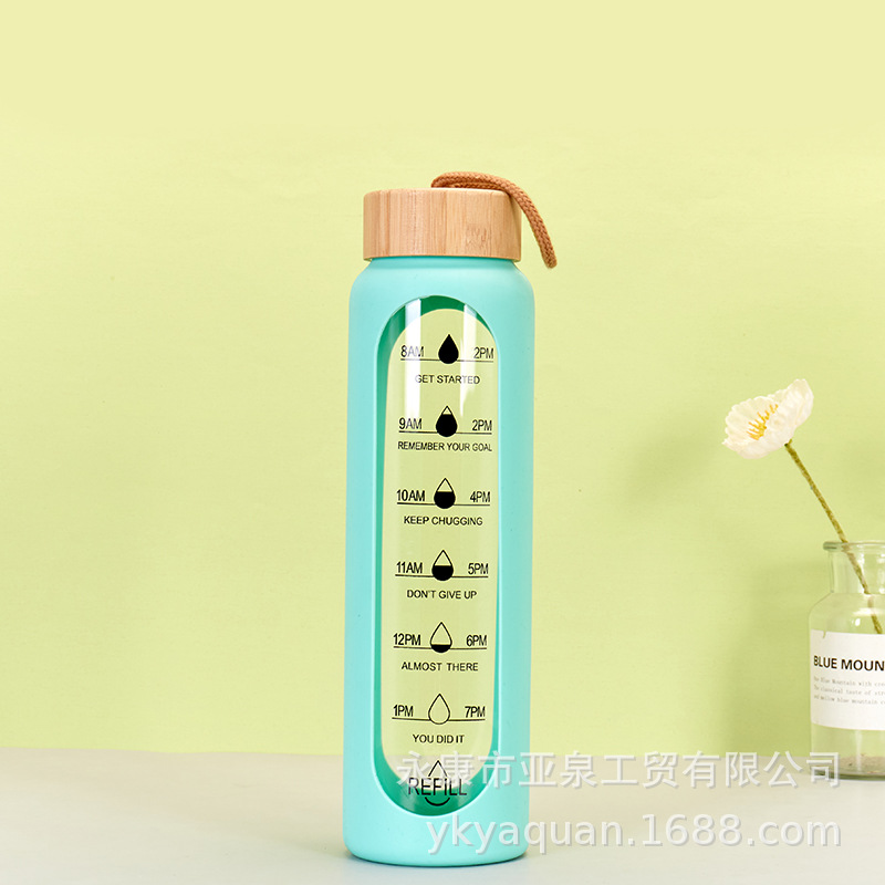 Cubierta de bambú transfronteriza de vidrio aislado de gran capacidad de una sola capa de vidrio de borosilicato taza de agua con taza de silicona cubierta protectora al por mayor