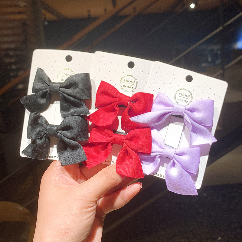Korean Style Solid Color Children's Bow Hairpin display picture 2
