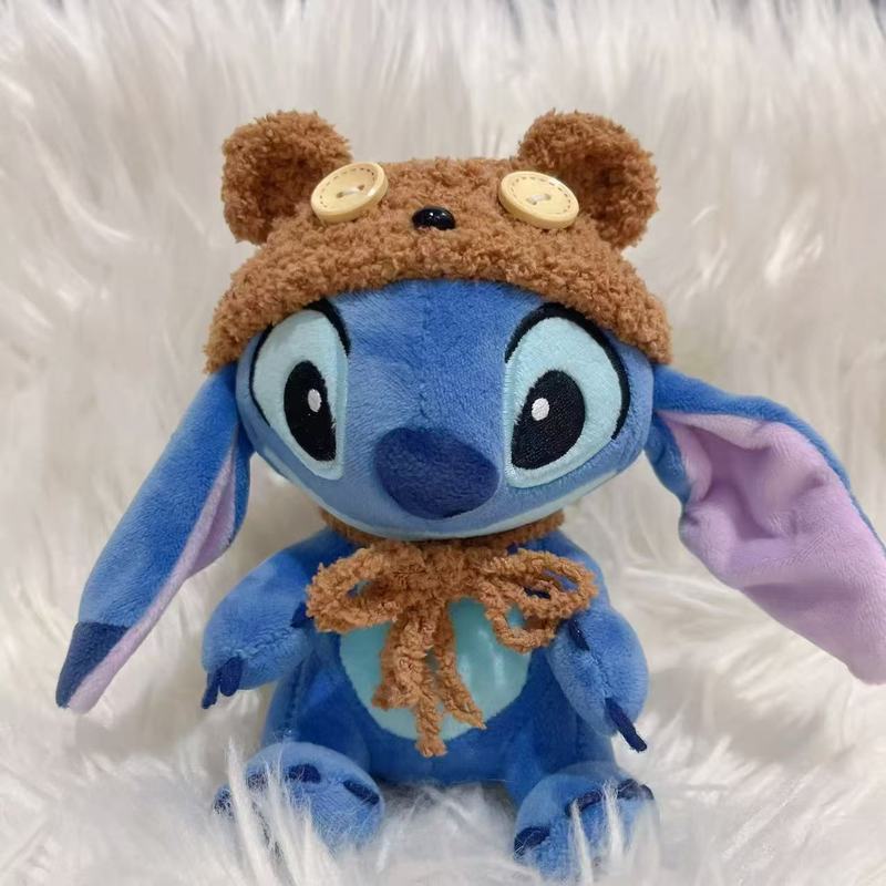 かわいいスティッチのストラップの頭カバーの子供服は、バッグのストラップのアクセサリーを着て、熊料理鼠の誕生日豚を自嘲します。|undefined