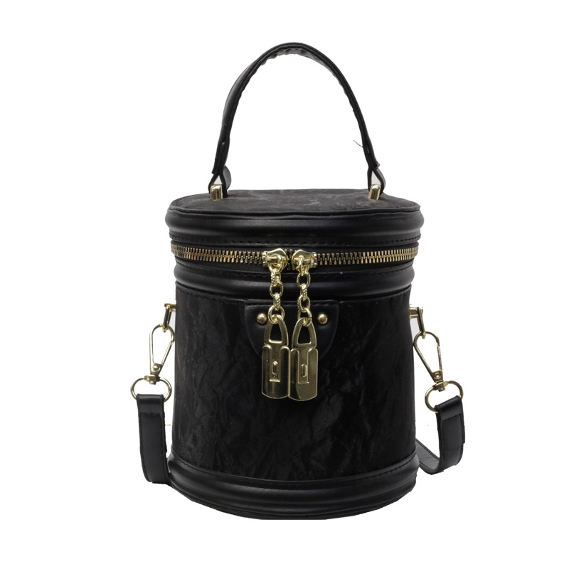 Bolso de mano popular de este año, bolso de mano para mujeres, verano 2024 nuevo estilo simple, bolso de hombro universal, bolso de cubo de tendencia explosiva.