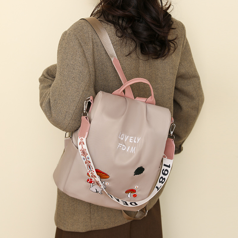 Comercio exterior al por mayor 2025 nueva mochila antirrobo para damas de alto valor moda bordado multifunción mochila de viaje marea