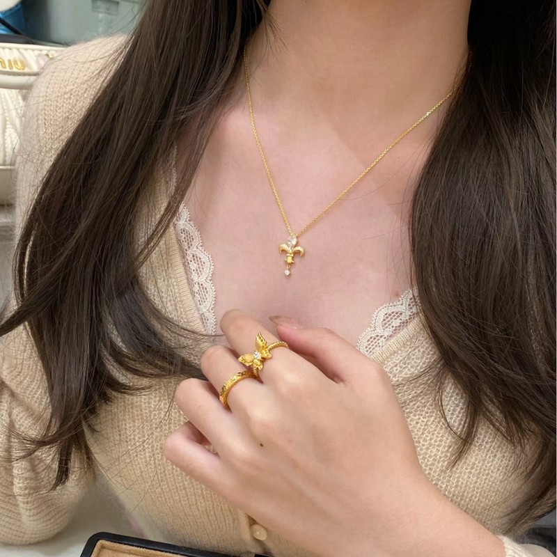 新商品の矢の形のアイリスの花の糸のネックレスの女性の軽くて豪華な大衆の高級感の甘くてかわいいです。|undefined