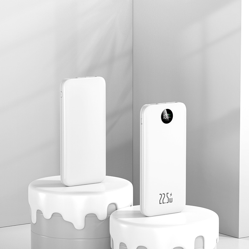 Los fabricantes suministran mini banco de energía portátil para viajes al aire libre, batería, pantalla digital de color sólido de gran capacidad, fuente de alimentación móvil multicolor