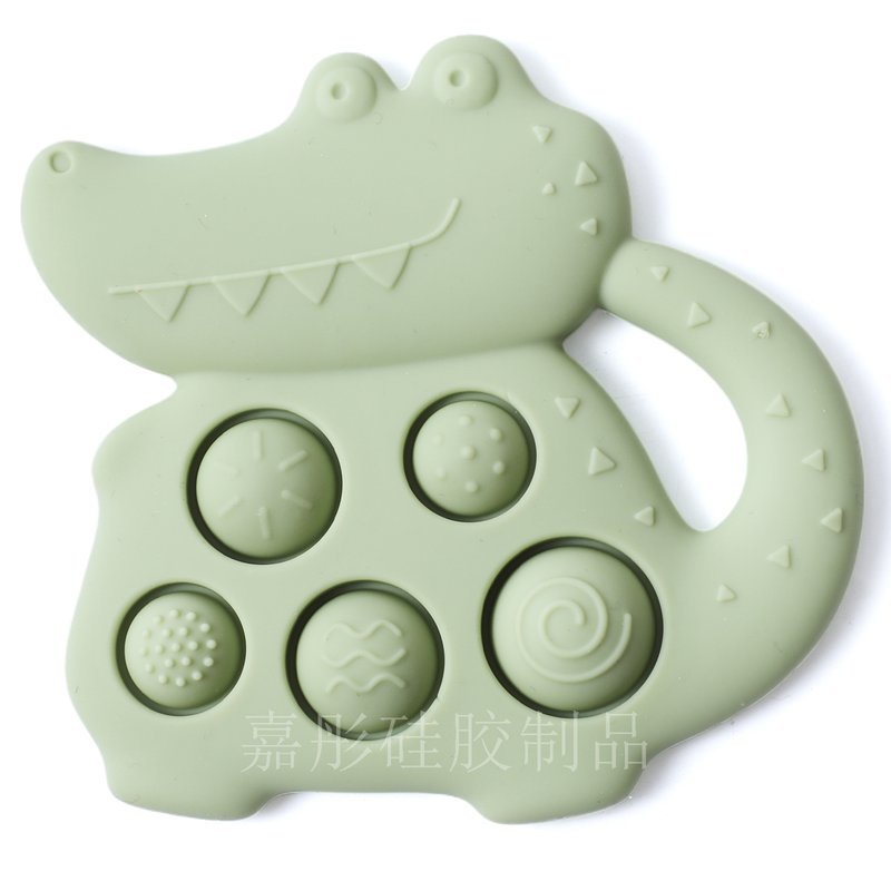 Silicone crocodile teether green