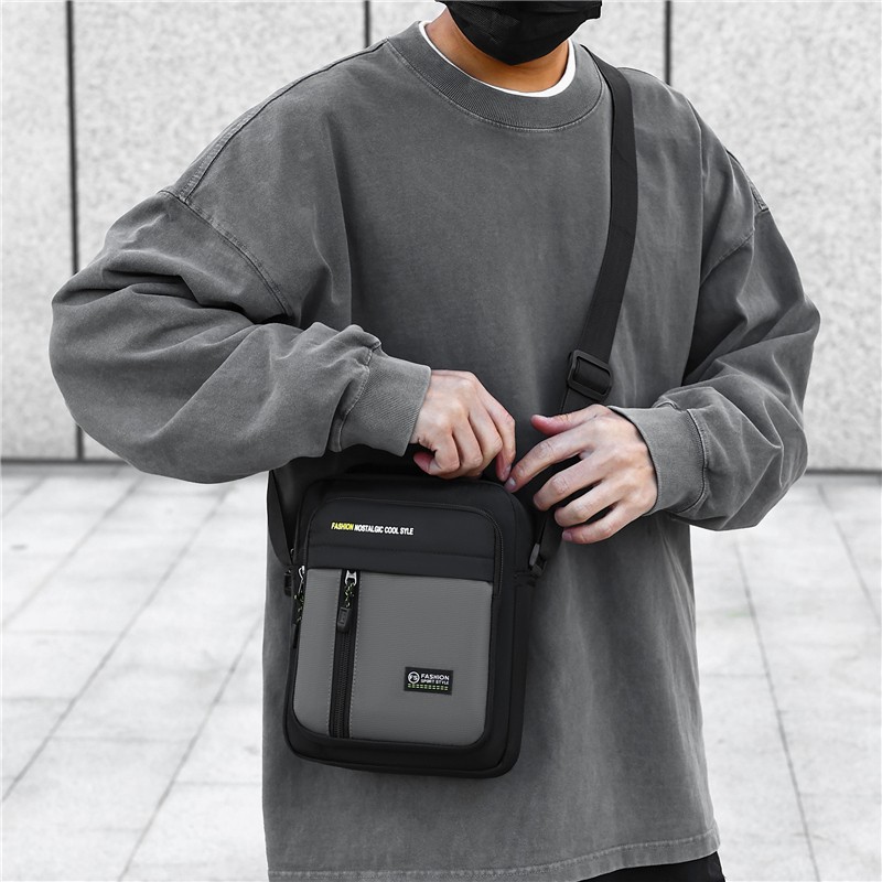 Comercio exterior nuevo bolso de hombro de moda para hombres, bolso de mano de viaje simple, bolso de hombro práctico tridimensional versátil