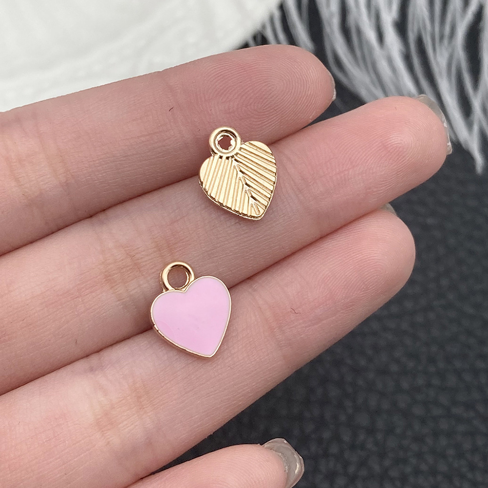 1 nectarina rosa con forma de corazón de amor 10x12mm - 11023 - 0,5g