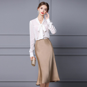 Long sleeved lace up shirt with thin satin skirt