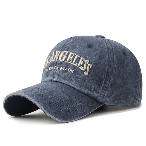 American-style washed baseball cap with an oversized, deep-curved design that flatters the face—vintage denim-inspired distressed look, featuring a trendy, extra-wide brim.
