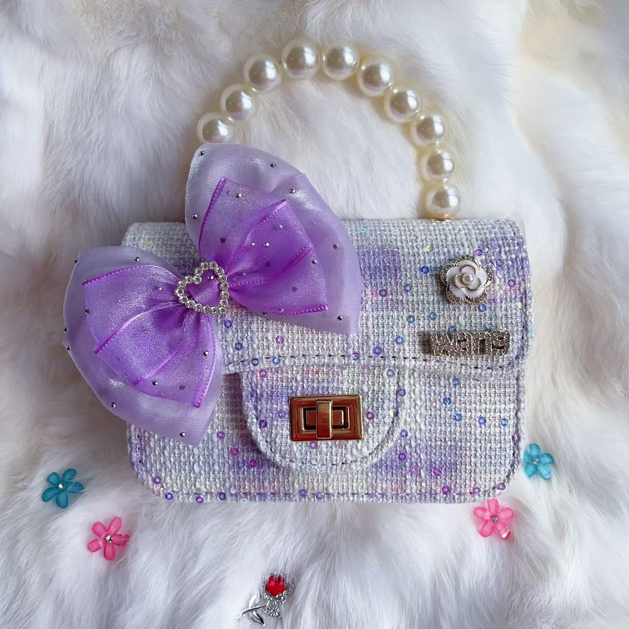 Nuevo tipo de bolsos para niños, bolsos de moda, bolsos de princesa de viento, bolsos portátiles lindos para chicas, bolsos de red para bebés.