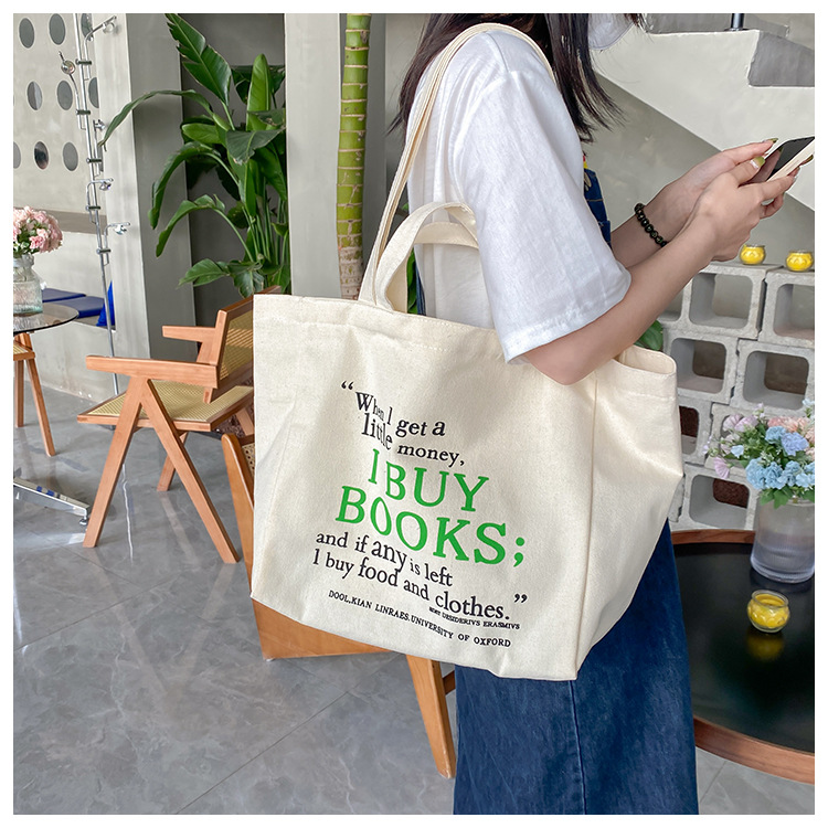 A large-capacity, sturdy Japanese-style canvas bag for women, a new 2022 simple bento handbag for girls to go to work undefined
