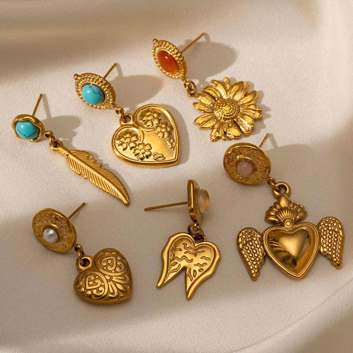 Taina europa y americana pernos de acero inoxidable compactos y exquisitos pernos de oro galvanizados 18k explosivos transfronterizos en joyas de orejas de viento para mujeres