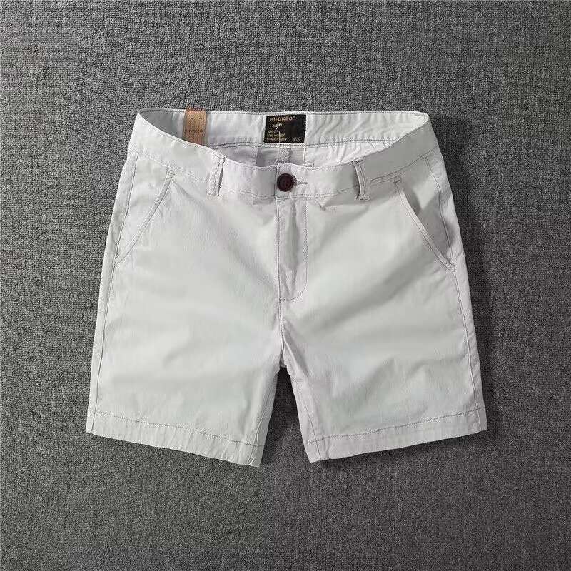 Pantalones cortos de gama alta de lujo ligero, pantalones de tres puntos para hombres, pantalones de traje de herramientas, moda empresarial británica, comercio exterior, venta al por mayor transfronteriza