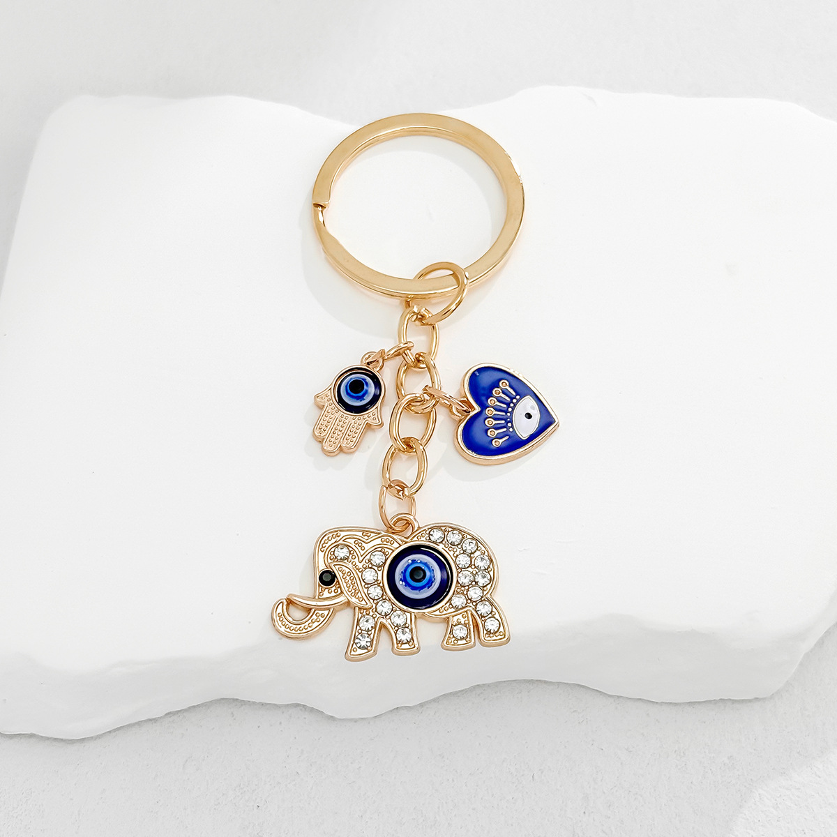 Cross-Border Hot Sale New Heart-Shaped Palm Water Drop Evil Eye Pendant Accessories Keychain Key Ring Manufacturer_voghion.com