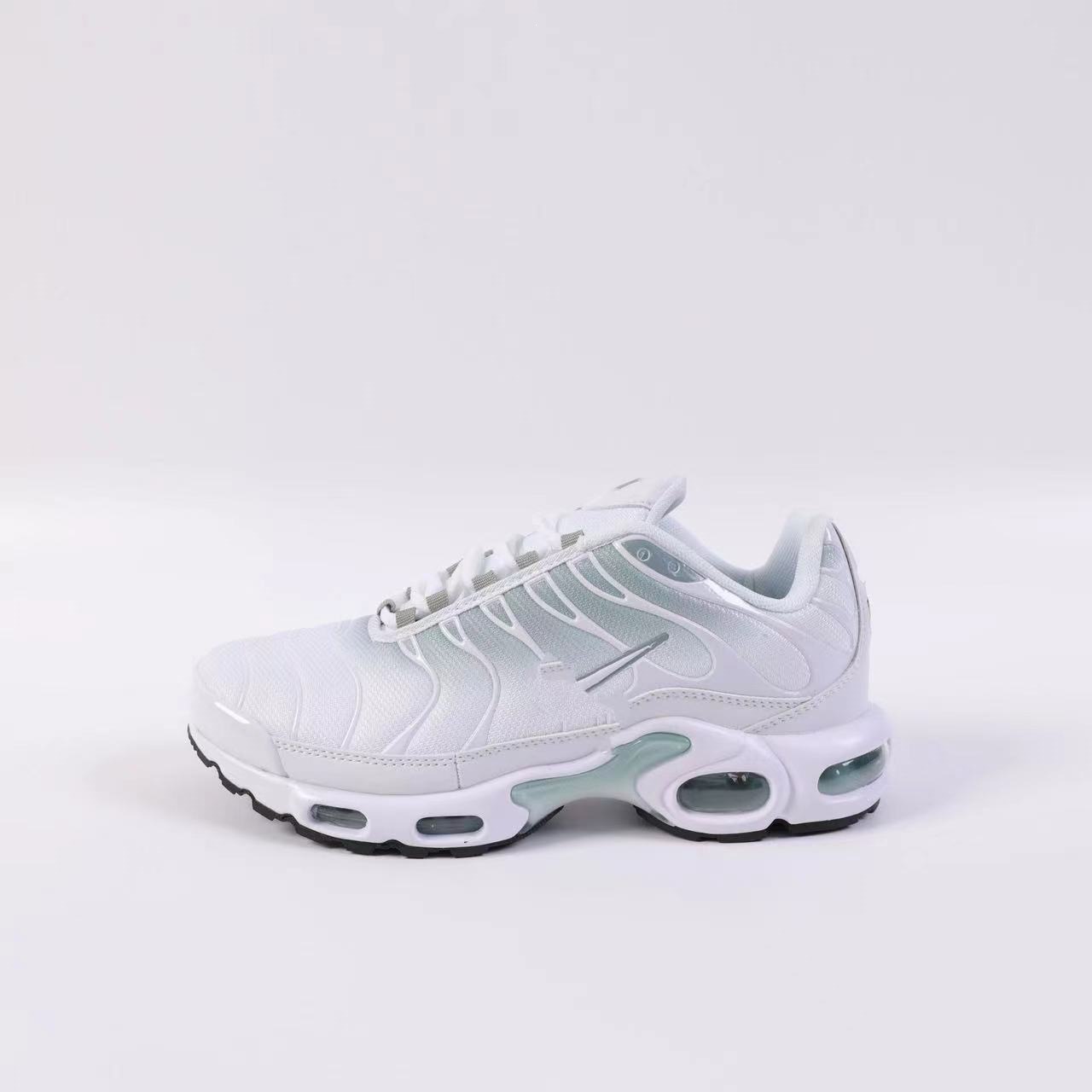 Putian transfronterizo 2025 TN1 generación de cojín de aire, zapatos de corrida casuales, zapatos deportivos de pelota azul, comercio exterior transfronterizo, una generación