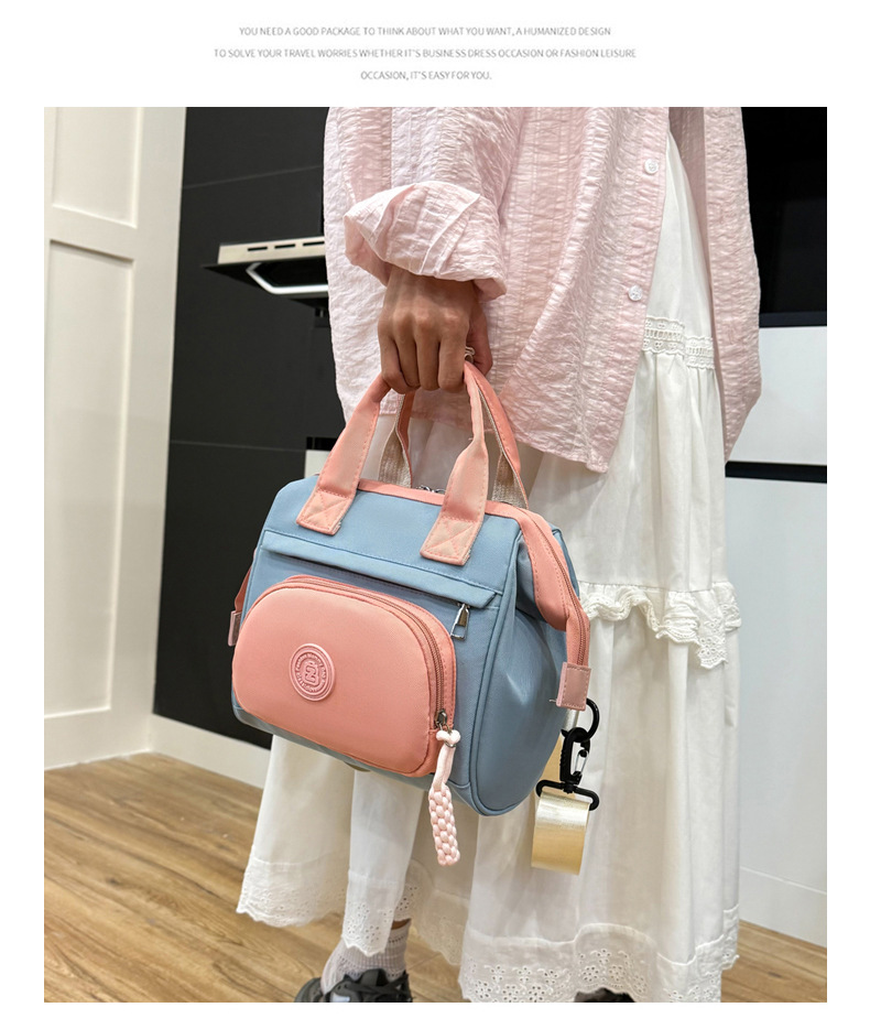 A portable small bag for women, a light backpack for shopping and commuting, fashionable Oxford fabric, a backpack for strolling kids, a mommy bag, a baby bag undefined