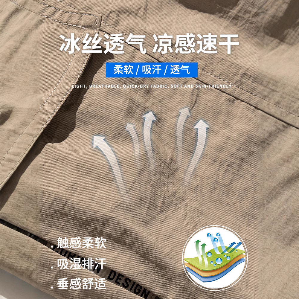 アメリカ式の大きいサイズのショートパンツの男性の夏の薄いタイプの新型の工装の5分のズボンの男性のタイプの氷の糸の速乾のカジュアルな中のズボン